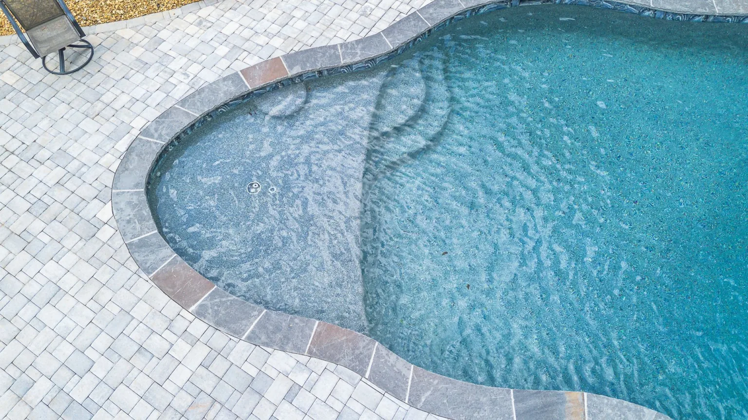 Pebble & Aggregate Finishes by Bulldog Pool Builders