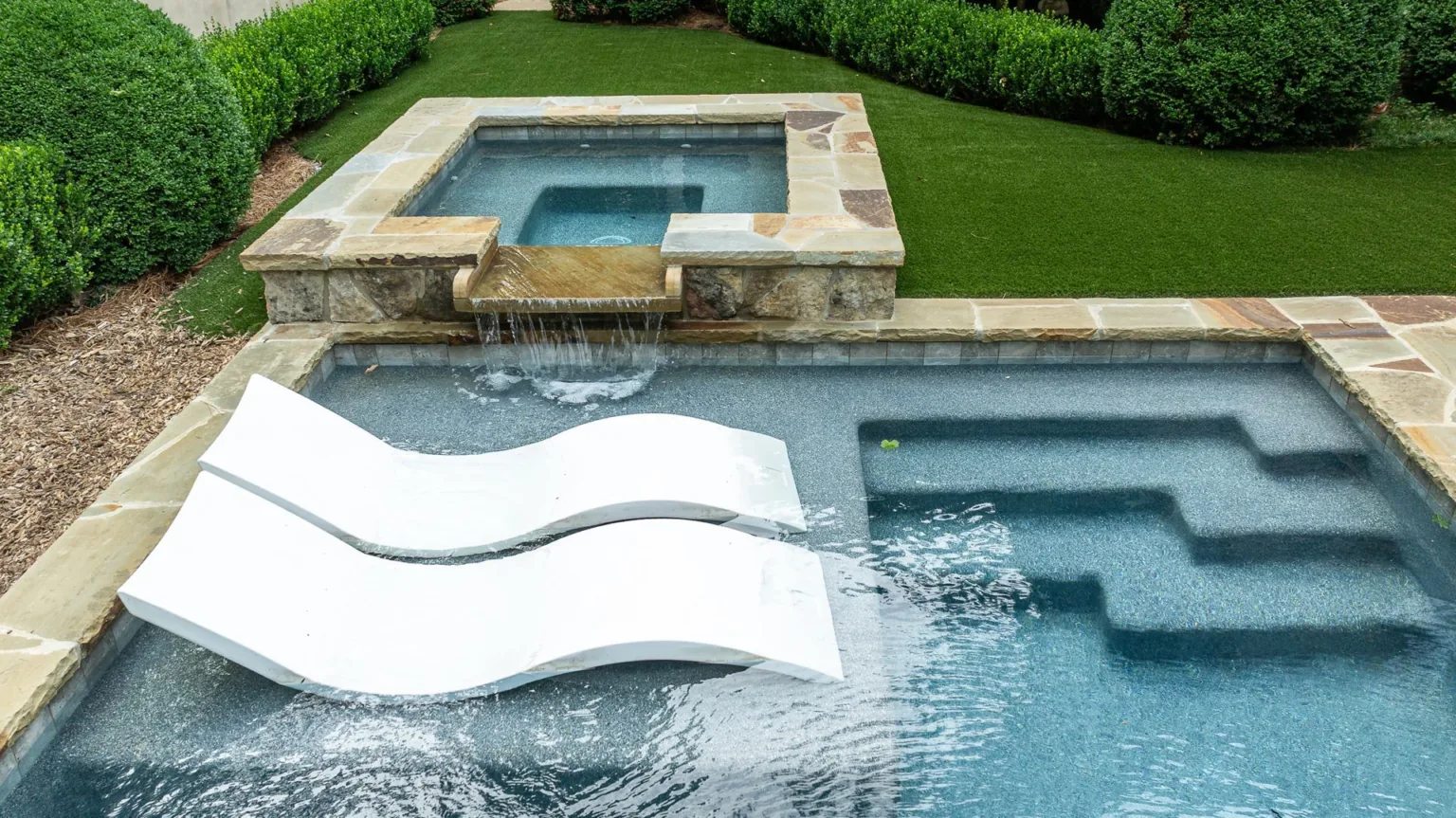 Tanning Ledges & Sun Shelves by Bulldog Pool Builders